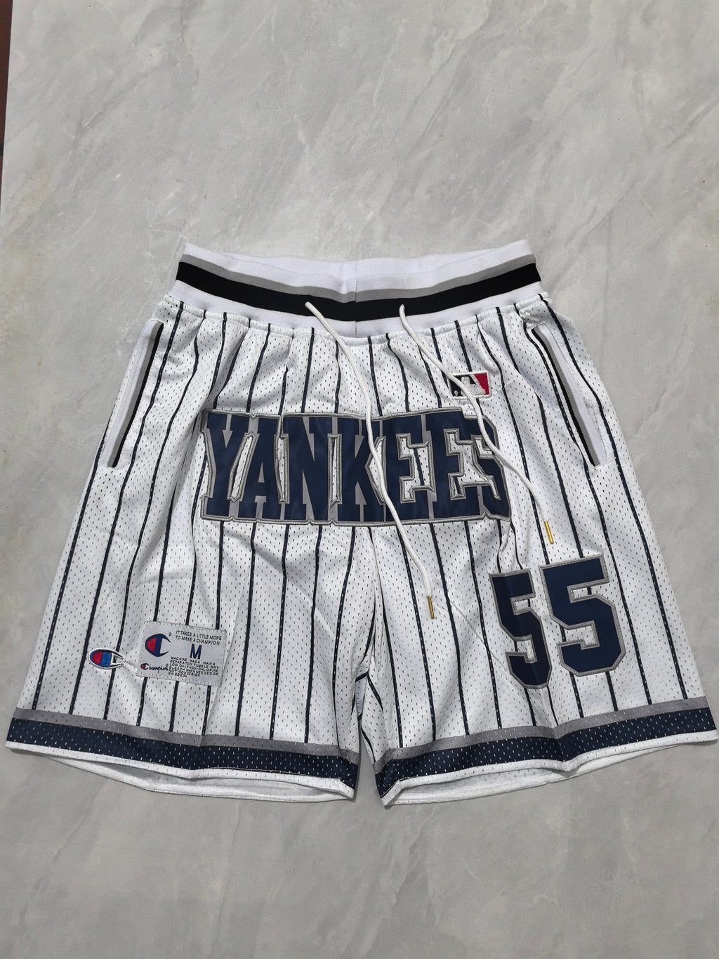 Champion Pinstripe Pocket Shorts – Baseball-Inspired Streetwear